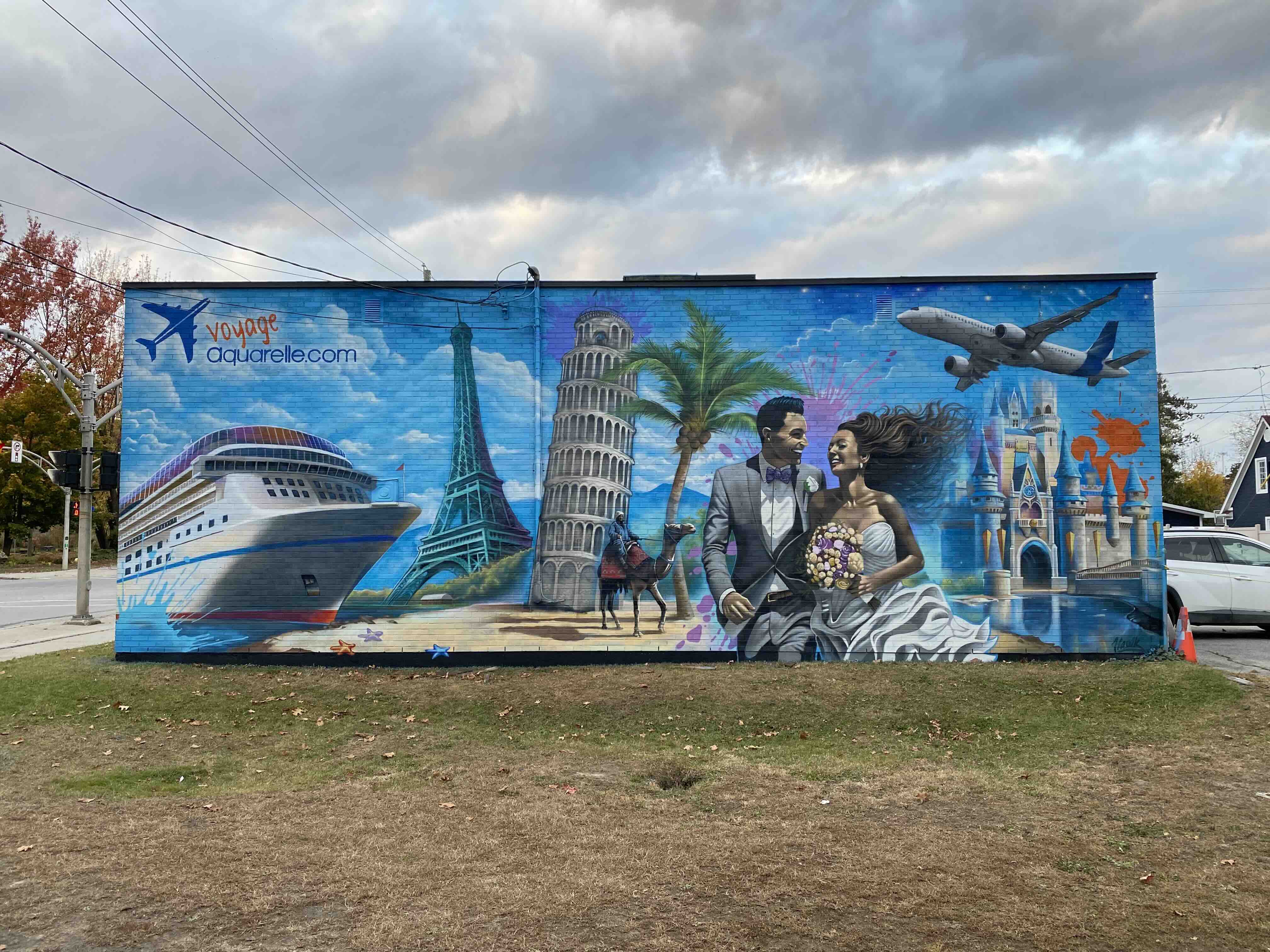 Murale extérieure thématique voyage monuments monde tour eiffel croisière couple